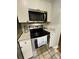 Stainless steel range and microwave in updated kitchen at 9661 Shore Dr. # 4B-15, Myrtle Beach, SC 29572