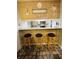 Kitchen with breakfast bar and beach-themed decor at 9661 Shore Dr. # 4B-15, Myrtle Beach, SC 29572