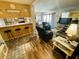 Living room with coastal decor, hardwood floors, and comfortable seating at 9661 Shore Dr. # 4B-15, Myrtle Beach, SC 29572