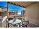 Covered patio with table and chairs, offering a relaxing space at 9661 Shore Dr. # 4B-15, Myrtle Beach, SC 29572
