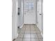 Hallway with tile floors and white doors at 1025 Carolina Rd. # D3, Conway, SC 29526