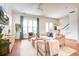 Bright living room with hardwood floors and comfy seating at 1143 Milford Way, Myrtle Beach, SC 29588