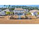 Aerial view of house showcasing backyard and landscaping at 1208 Maxwell Dr., Little River, SC 29566