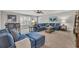Spacious bonus room with sectional sofa and plenty of natural light at 1208 Maxwell Dr., Little River, SC 29566