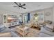 Living room with comfy seating, TV, and access to backyard at 1208 Maxwell Dr., Little River, SC 29566