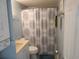 Clean bathroom with shower/tub combo, toilet and vanity at 1210 Benna Dr. # B, Myrtle Beach, SC 29577