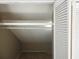 Small attic closet with hanging rod and shelving at 1210 Benna Dr. # B, Myrtle Beach, SC 29577