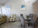 Small dining area with glass-top table and chairs at 1210 Benna Dr. # B, Myrtle Beach, SC 29577