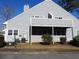 Rear view of house with deck and AC units at 1210 Benna Dr. # B, Myrtle Beach, SC 29577