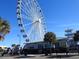 SkyWheel Myrtle Beach and a nearby restaurant at 1210 Benna Dr. # B, Myrtle Beach, SC 29577
