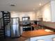 Modern kitchen with stainless steel appliances and an island at 1210 Benna Dr. # B, Myrtle Beach, SC 29577