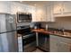 Updated kitchen with stainless steel appliances and a dishwasher at 1210 Benna Dr. # B, Myrtle Beach, SC 29577