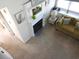 Living room with fireplace, green couch, and hardwood floors at 1210 Benna Dr. # B, Myrtle Beach, SC 29577