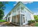 Side view of two-story building with screened porches at 1262 River Oaks Dr. # 13B, Myrtle Beach, SC 29579