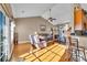 Sunlit living room with hardwood floors, vaulted ceiling and comfortable seating at 134 Vineyard Lake Circle, Conway, SC 29527