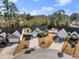 A lovely single story home with a driveway, palm tree, and small backyard shed at 160 Maggie Way, Myrtle Beach, SC 29588
