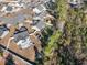 Aerial shot of a home with mature trees in the backyard and a small backyard swimming pool at 160 Maggie Way, Myrtle Beach, SC 29588