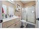 Clean and functional bathroom with a white vanity, a large mirror, and a glass-enclosed shower at 160 Maggie Way, Myrtle Beach, SC 29588