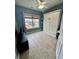 This bedroom features a neutral color scheme and a murphy bed for efficient use of space at 160 Maggie Way, Myrtle Beach, SC 29588
