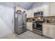 Well-equipped kitchen featuring stainless steel appliances, granite countertops, and ample cabinet space for storage at 160 Maggie Way, Myrtle Beach, SC 29588