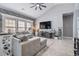Cozy living room featuring comfortable seating, natural light, and a view of the entertainment area at 160 Maggie Way, Myrtle Beach, SC 29588
