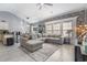 Spacious living room with vaulted ceilings, neutral decor, and an open floor plan leading to the dining area at 160 Maggie Way, Myrtle Beach, SC 29588