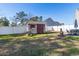 Backyard shed with a small window and decorative bench at 160 Maggie Way, Myrtle Beach, SC 29588