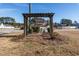 Bristol Pines community entrance sign with trees and landscaping at 160 Maggie Way, Myrtle Beach, SC 29588