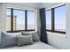 Bedroom with ocean views from multiple windows at 1605 S Ocean Blvd. # 1006, Myrtle Beach, SC 29577