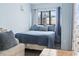 Bright bedroom with a queen bed and ocean views at 1605 S Ocean Blvd. # 1006, Myrtle Beach, SC 29577