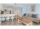Modern kitchen with stainless steel appliances and breakfast bar at 1605 S Ocean Blvd. # 1006, Myrtle Beach, SC 29577