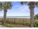 Oceanfront view with palm trees and beach access at 1605 S Ocean Blvd. # 1006, Myrtle Beach, SC 29577