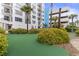 Landscaped putting green with lush greenery near building at 1605 S Ocean Blvd. # 1006, Myrtle Beach, SC 29577