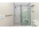 Modern bathroom featuring a glass enclosed shower with gray and white marble tiling at 1609 Harbor Dr., North Myrtle Beach, SC 29582