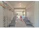 Under house storage area with bikes, kayaks, ladder, and seating at 1609 Harbor Dr., North Myrtle Beach, SC 29582