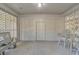 Under house patio with seating, tables, and white lattice at 1609 Harbor Dr., North Myrtle Beach, SC 29582