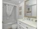 Clean bathroom with a shower/tub combo, white vanity, and coastal decor at 161 Seawatch Dr. # 1017, Myrtle Beach, SC 29572