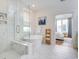 Elegant bathroom with a soaking tub, walk-in shower, and marble floors at 1623 Sayebrook Pkwy., Myrtle Beach, SC 29588
