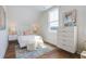 Bright bedroom featuring a comfy bed and stylish dresser at 1623 Sayebrook Pkwy., Myrtle Beach, SC 29588