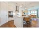 Modern kitchen with white cabinets, marble countertops, and stainless steel appliances at 1623 Sayebrook Pkwy., Myrtle Beach, SC 29588