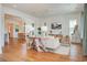 Spacious living room with hardwood floors, large windows and an open floor plan at 1623 Sayebrook Pkwy., Myrtle Beach, SC 29588