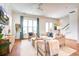 Bright and airy living room with hardwood floors and comfortable seating at 1623 Sayebrook Pkwy., Myrtle Beach, SC 29588