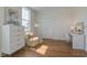 Home office with a white desk, comfortable chair, and large window at 1623 Sayebrook Pkwy., Myrtle Beach, SC 29588