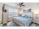 Main bedroom with a king-size bed and calming coastal decor at 173 Olde Towne Way # 3, Myrtle Beach, SC 29588