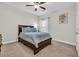 Cozy bedroom with carpeted floors and a comfortable bed at 1780 Sapphire Dr., Longs, SC 29568