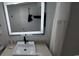 Clean bathroom with a vanity, sink and illuminated mirror at 2000 N Ocean Blvd. # 1206, Myrtle Beach, SC 29577