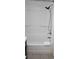 Simple white bathroom with shower/tub and tile floor at 2000 N Ocean Blvd. # 1206, Myrtle Beach, SC 29577