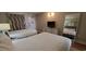 Two twin beds, dresser, TV, and mirror at 2000 N Ocean Blvd. # 1206, Myrtle Beach, SC 29577