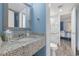 Guest bathroom with granite vanity and toilet at 210 75Th Ave N # 4054, Myrtle Beach, SC 29572