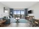 Bright living room boasts ocean view and comfortable seating at 210 75Th Ave N # 4054, Myrtle Beach, SC 29572